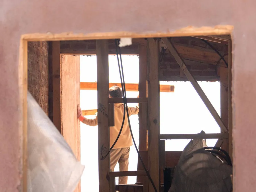 Construction Worker at Indoor Renovation Site