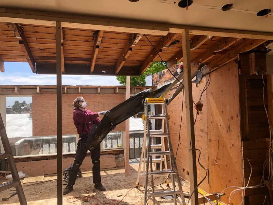 A Man Working on a House Renovation