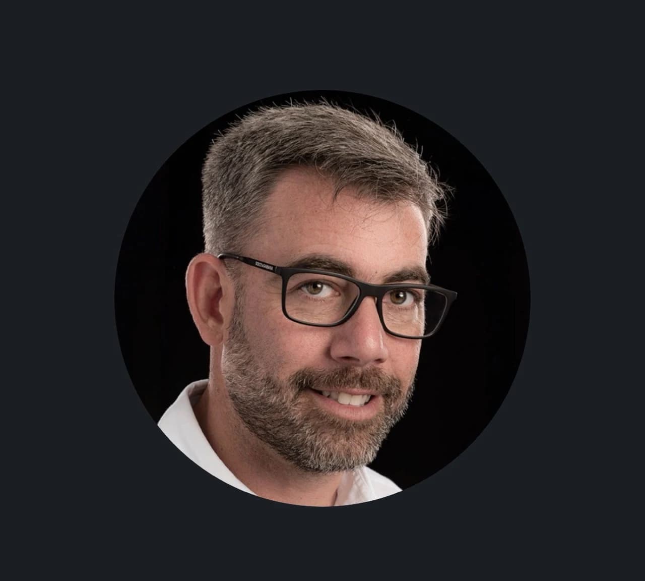 Kilay Reinfeld, founder of Conservus, wearing glasses and a white shirt